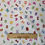 Thumbnail: Colorful letters on white fabric with The Fabric Squirrel ruler 