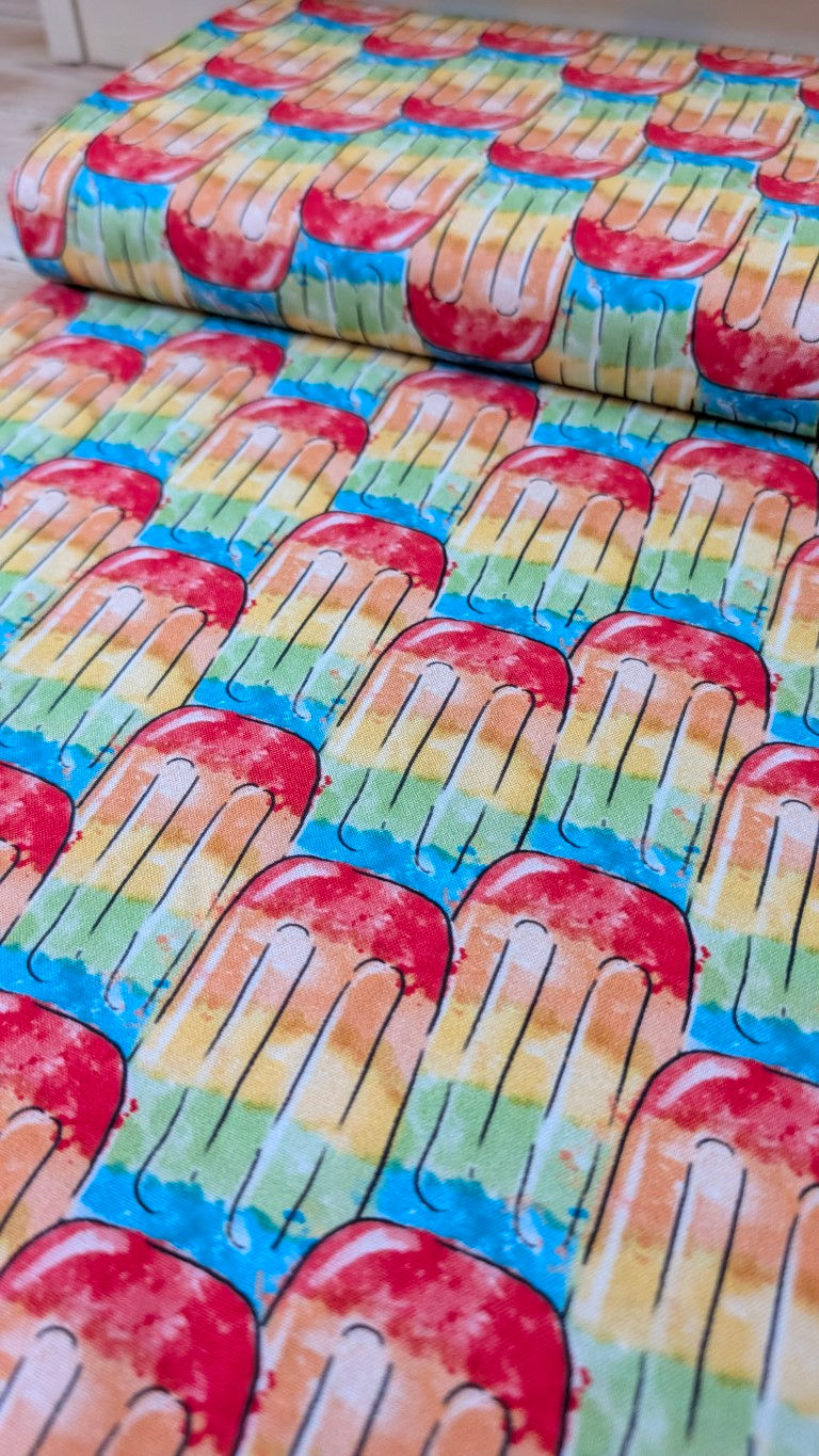 Thumbnail: Fabric with colorful popsicle pattern, a vibrant summer design close-up.