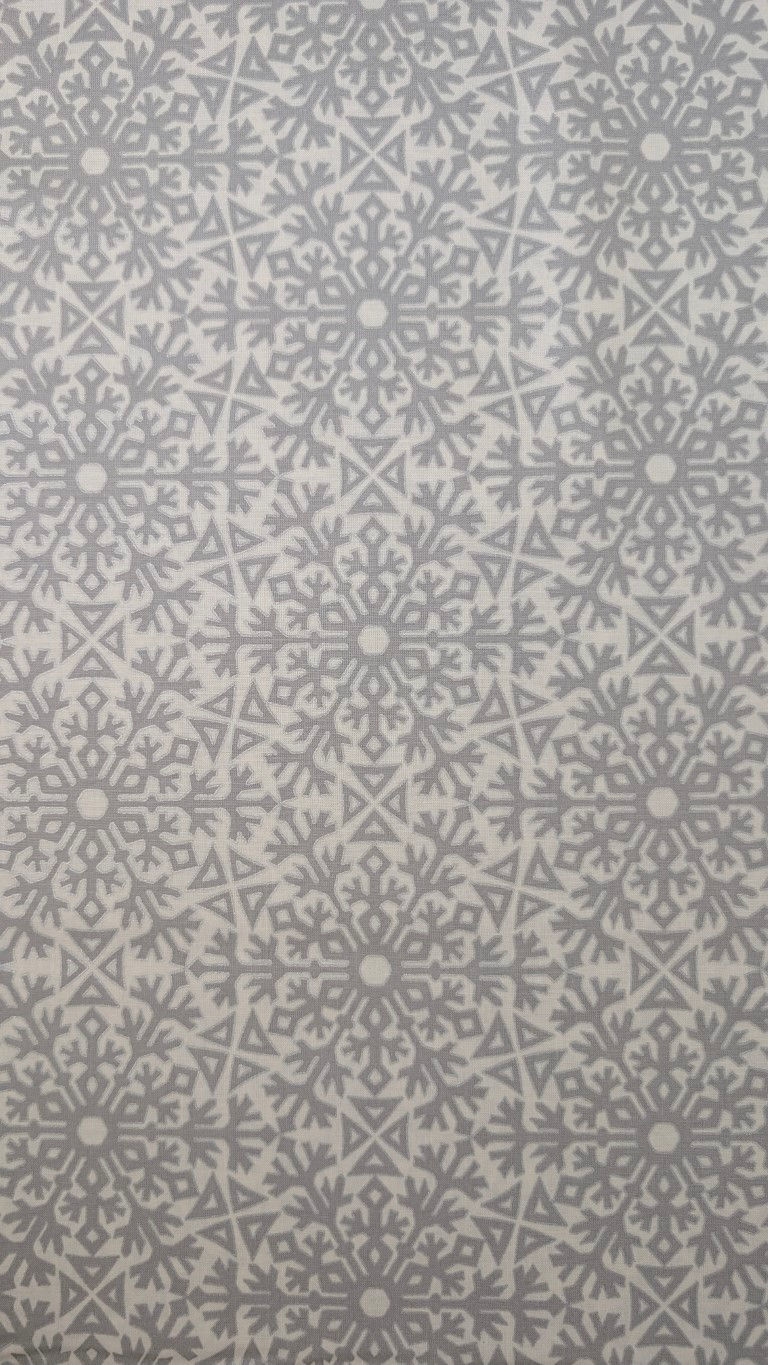 Thumbnail: Snowflake fabric pattern with grey and white. Flora Beatrice Floral Fabric - Liberty Quilting Cotton.
