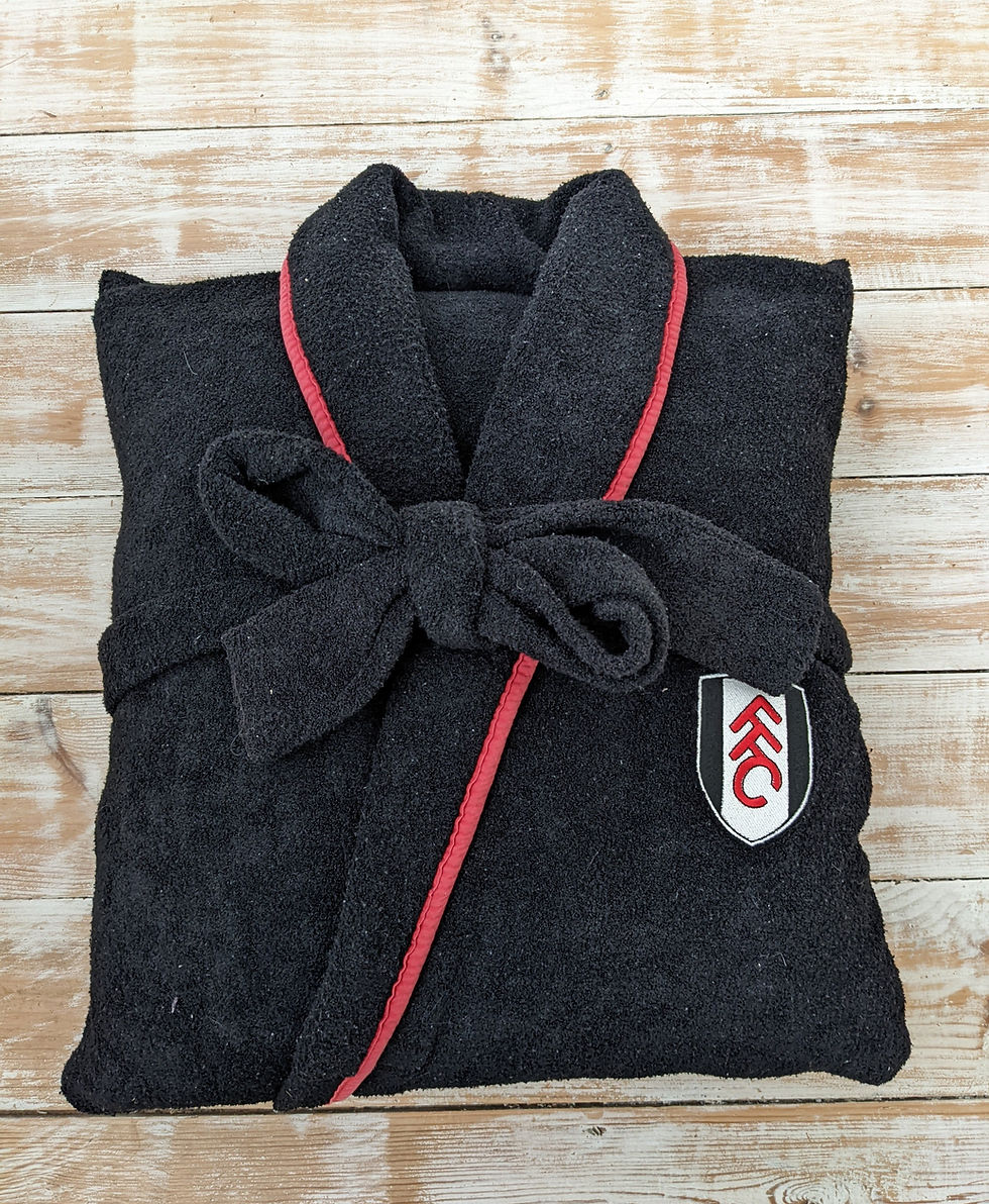Thumbnail: Keepsake cushion made with a single dressing gown. The tie was preserved so it can be tied around the centre.