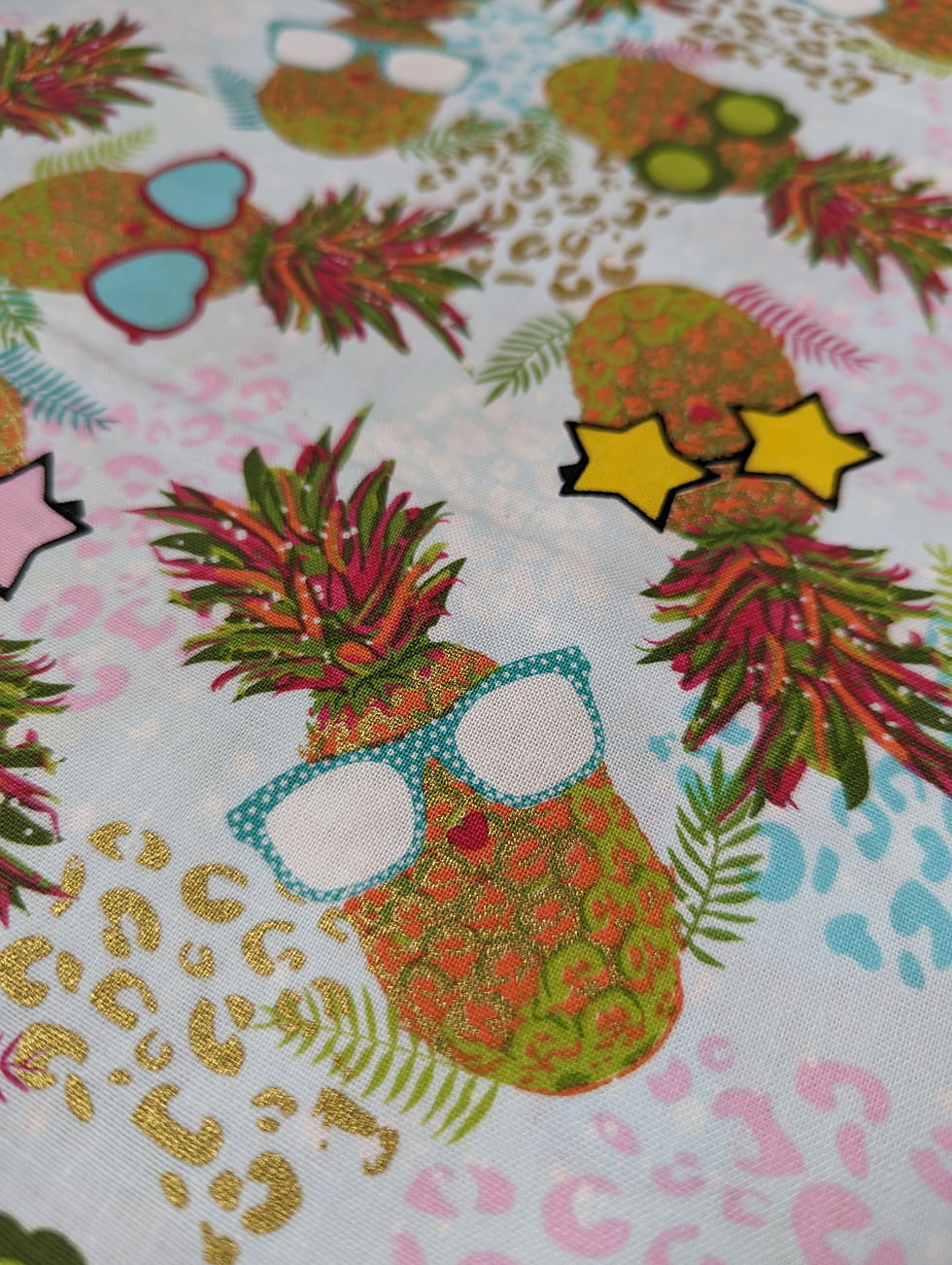 Thumbnail: Pineapple-print fabric featuring pineapples with sunglasses and leopard print background