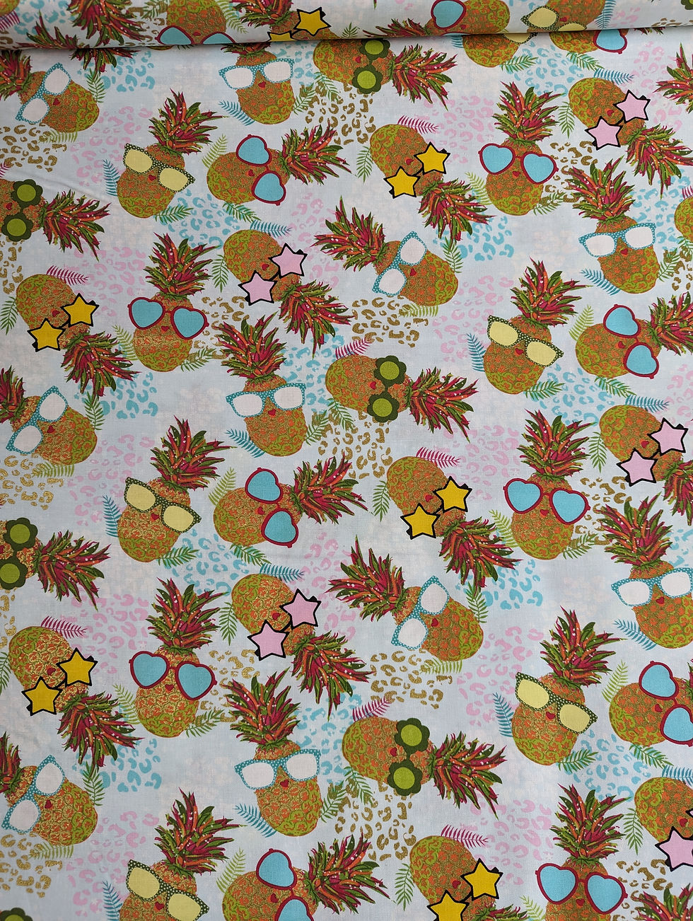 Thumbnail: Pineapple fabric pattern, wearing sunglasses, various colors, fun and whimsical background.