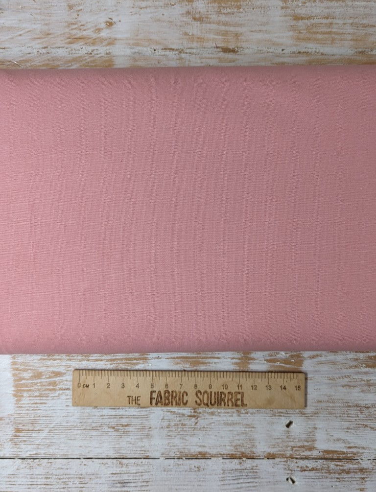 Thumbnail: Solid pink fabric with ruler. The Fabric Squirrel branding is visible.