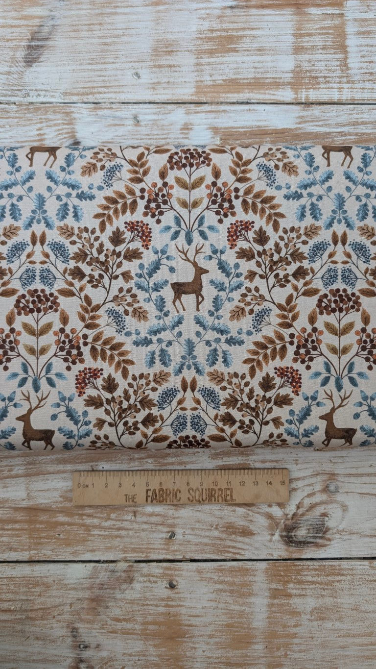 Thumbnail: Fabric with deer and floral patterns, brown and blue, The Fabric Squirrel.