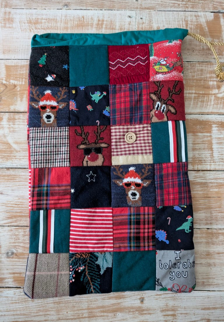 Thumbnail: Quilted Christmas stocking with reindeer, plaid and various prints Crafts by Katie