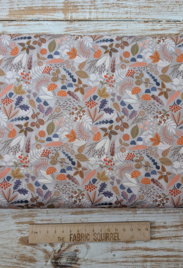 Thumbnail: Floral pattern fabric with orange, blue, and white leaves; The Fabric Squirrel