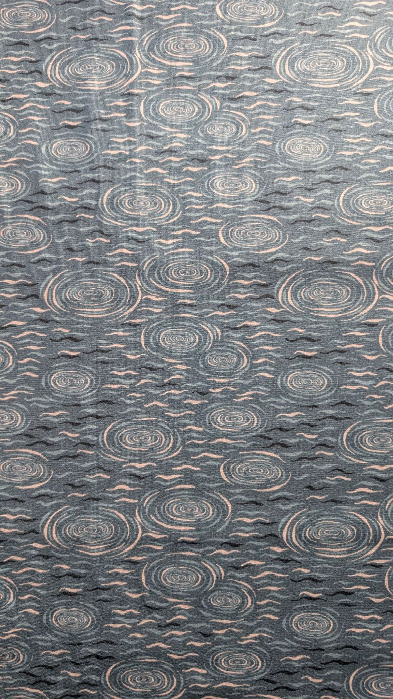Thumbnail: Abstract pattern of swirling circles and waves, blue and white, textile design.