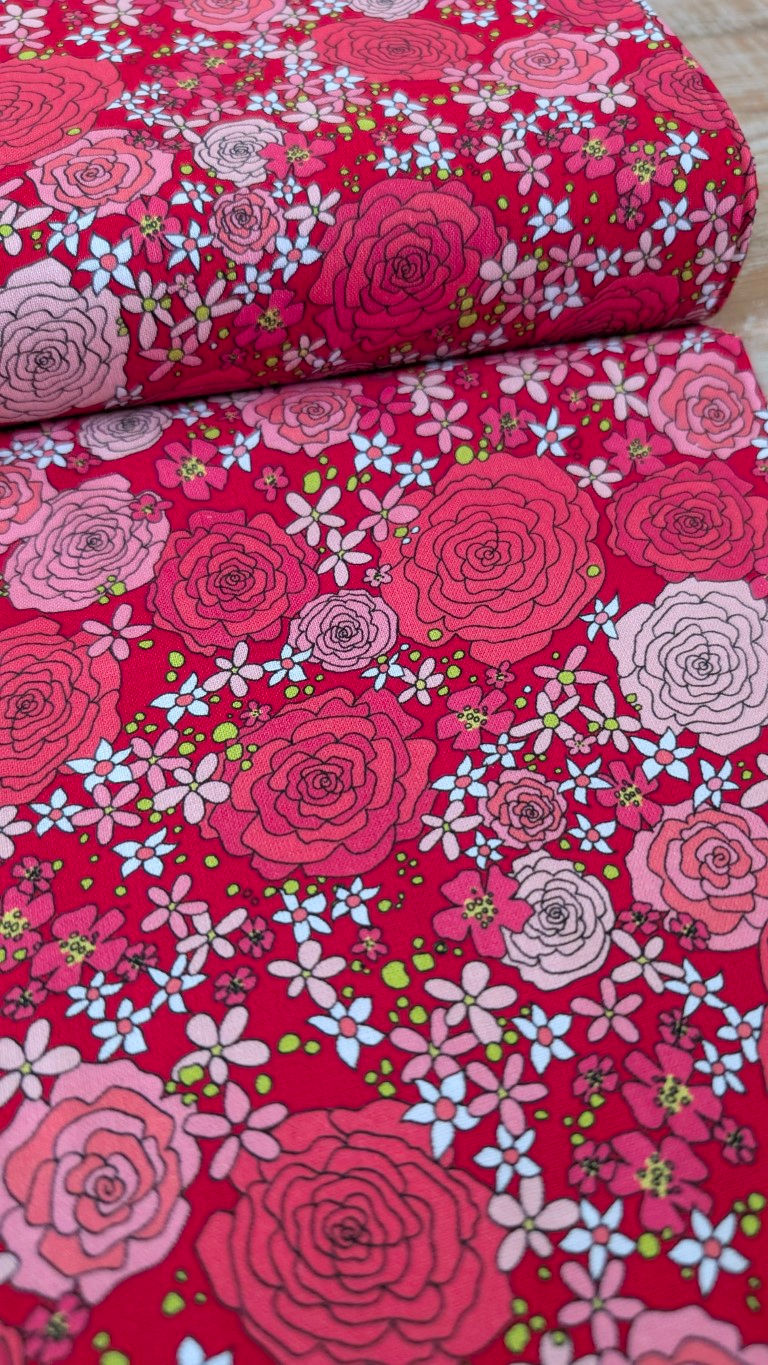 Thumbnail: Red Floral Fabric - Rainbow Garden Organic Cotton The Crafty Lass, red flowers and fabric close up shot.