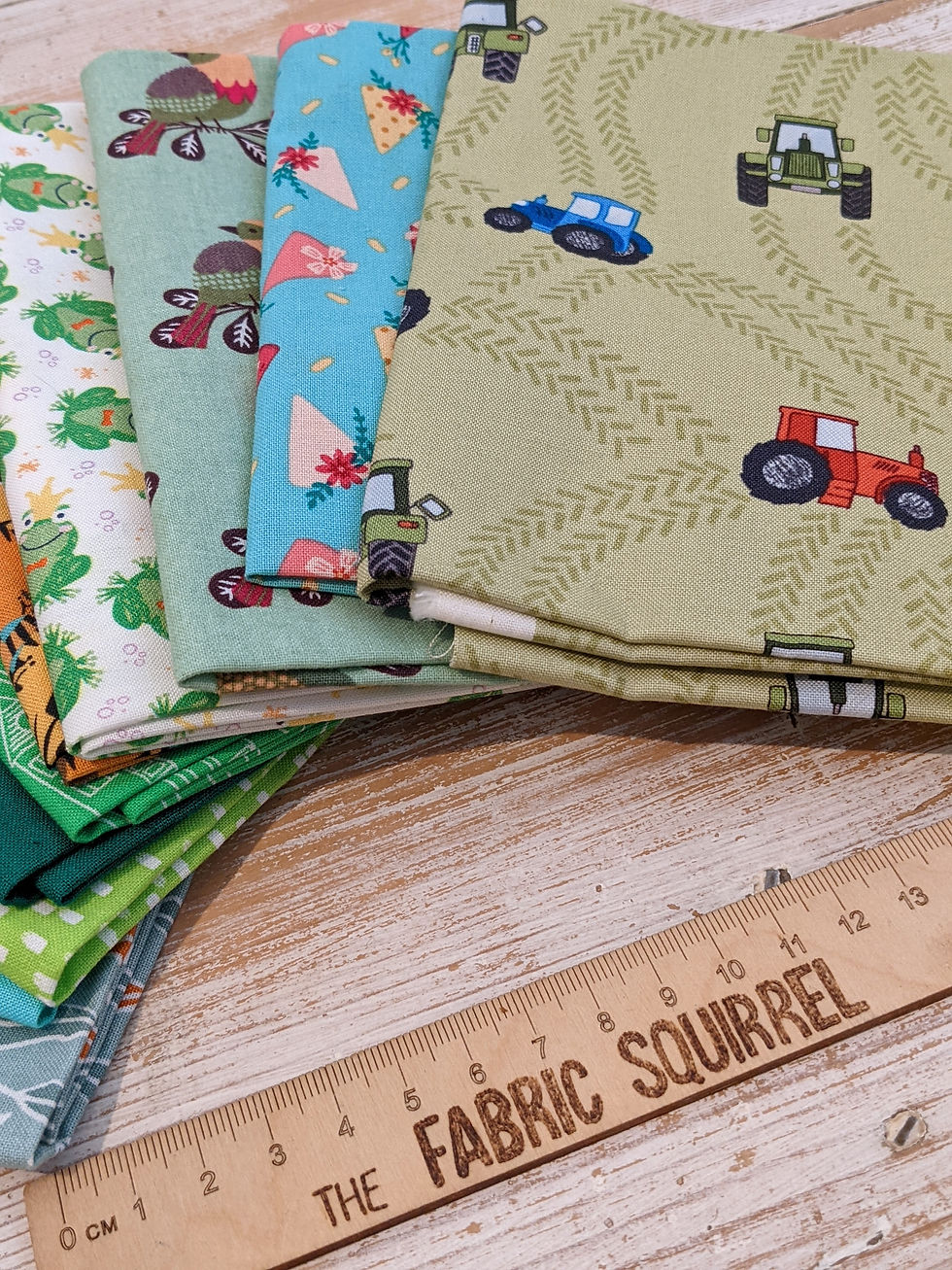 Thumbnail: Various fabrics with tractors and patterns, including The Fabric Squirrel.