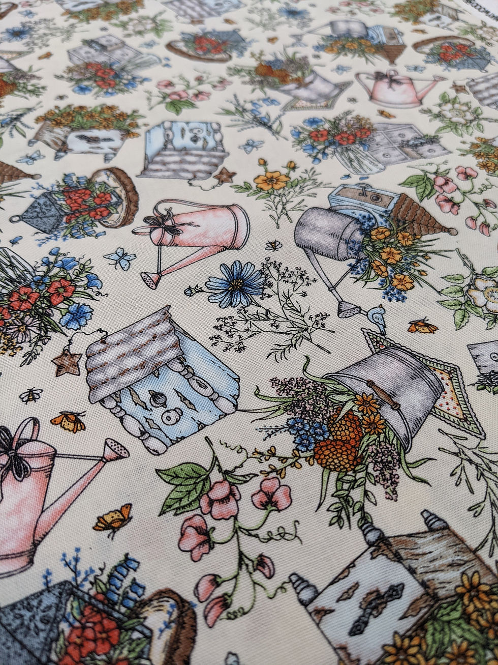 Thumbnail: Floral print fabric with watering cans, flowers, and birdhouses; The Fabric Squirrel.