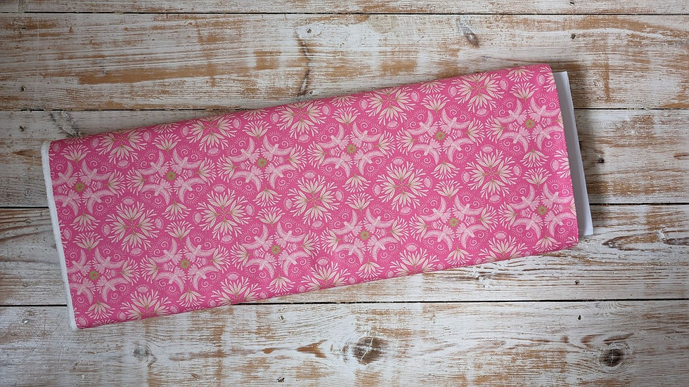 Thumbnail: Pink fabric with floral pattern on wooden surface. The Fabric Squirrel