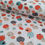 Thumbnail: Fabric with orange, teal, and white pumpkins; seasonal decor background.