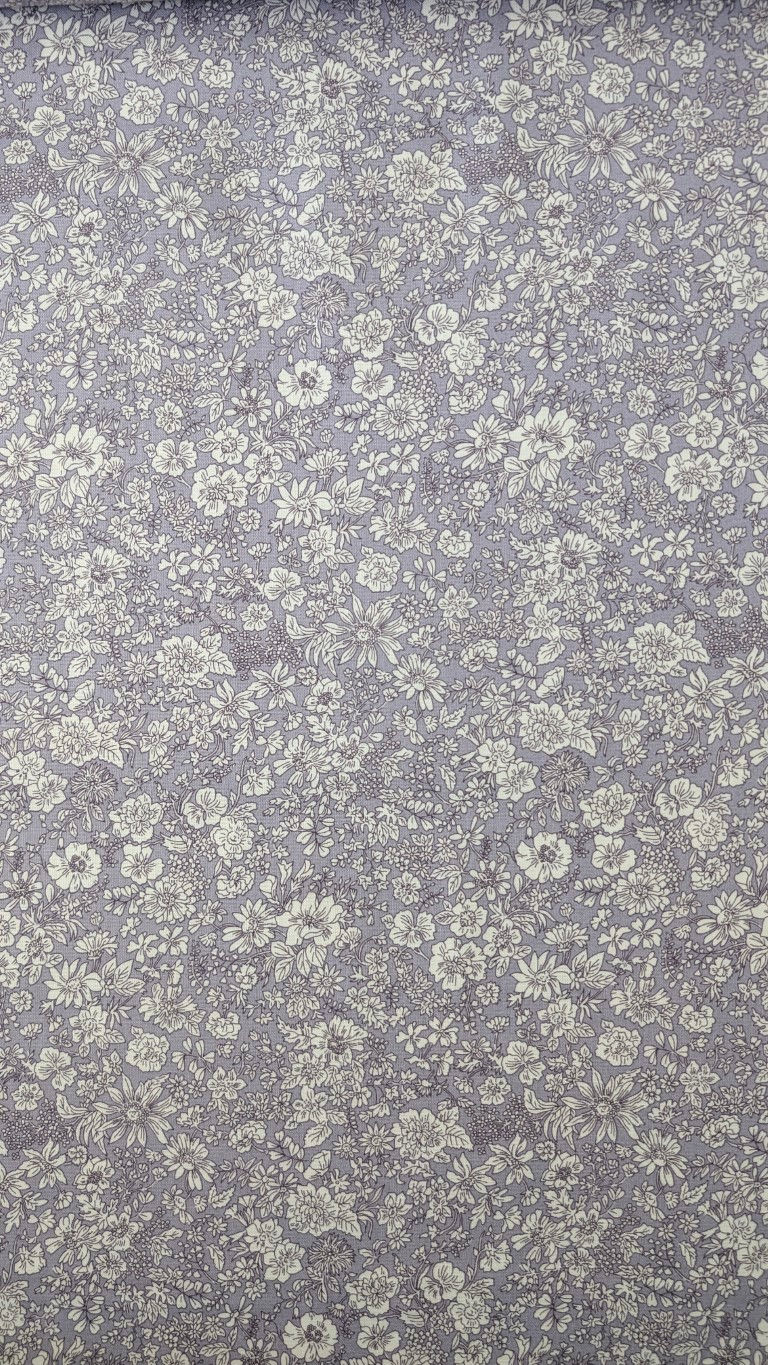 Thumbnail: Floral fabric with small white flowers. Spring Petals Floral Fabric - Heirloom 5, The Fabric Squirrel.