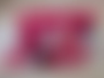 Set of family stockings made from child's first Christmas clothes for baby mum and dad