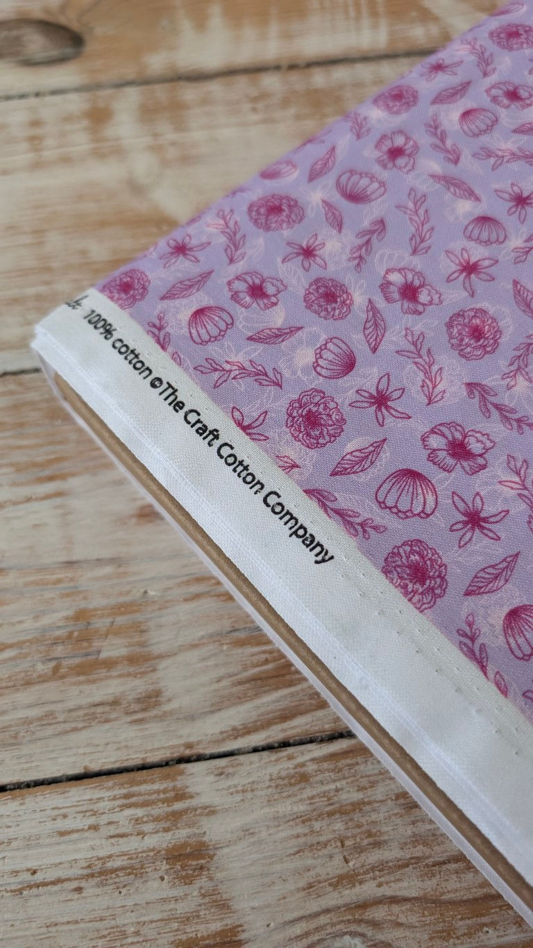 Thumbnail: Floral fabric with text: 100% cotton, The Craft Cotton Company, shell print.