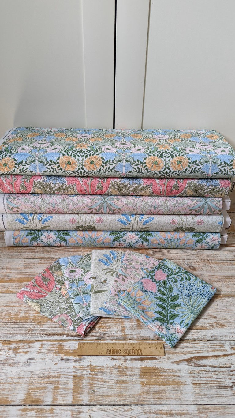 Thumbnail: Stacked floral fabric featuring Liberty Tree Floral Bird Fabric - Tree of Life designs on display