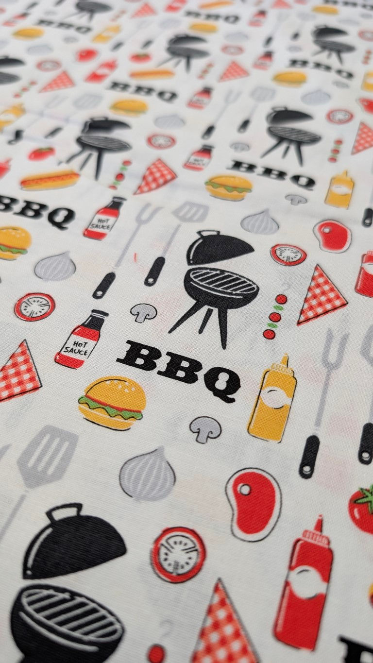 Thumbnail: BBQ pattern fabric featuring illustrations of burgers, hotdogs, and grilling essentials.