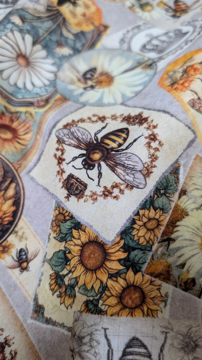 Thumbnail: Fabric square with a bee and sunflower design, details visible. The Fabric Squirrel