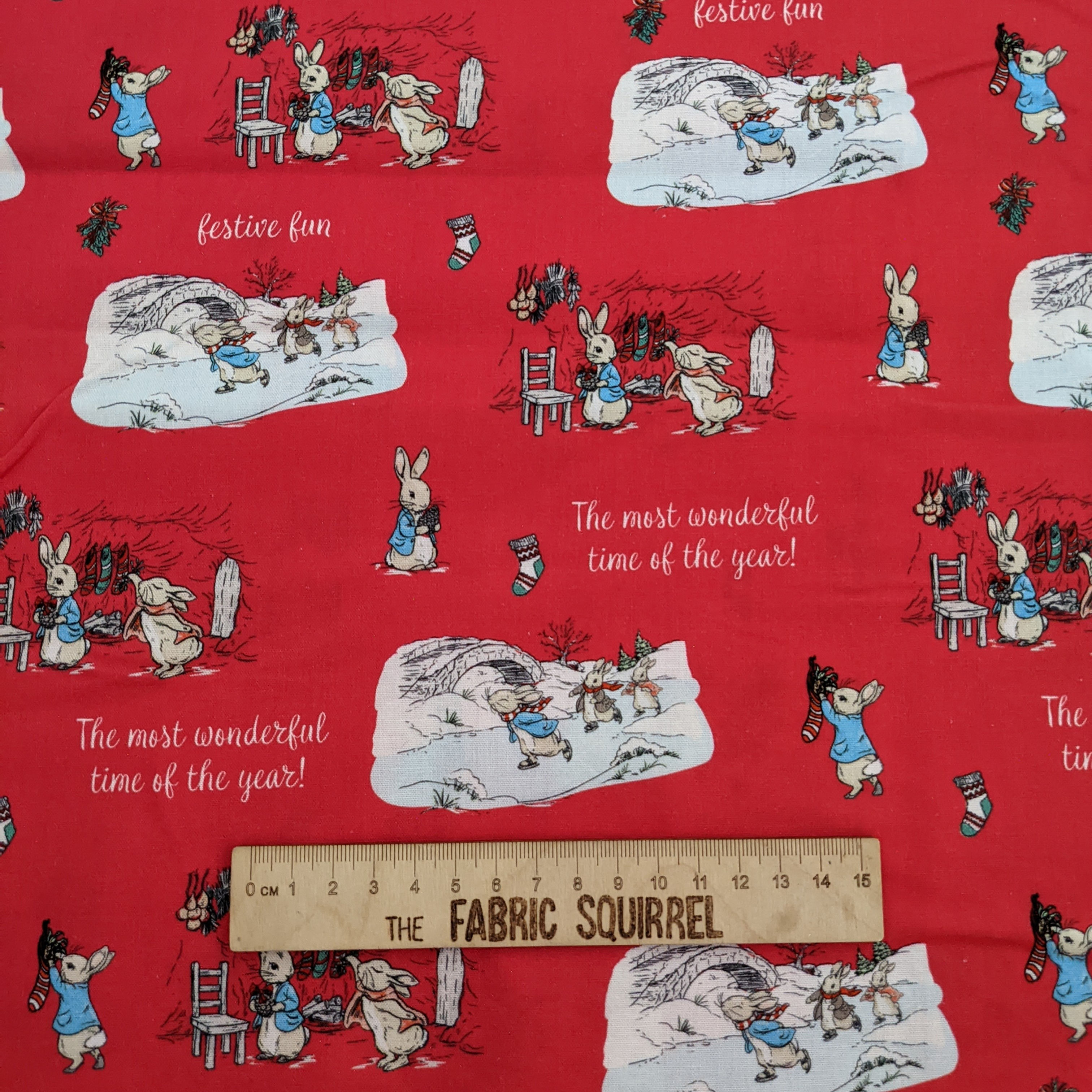 Red fabric with Peter Rabbit design, The most wonderful time of the year! The Fabric Squirrel