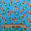 Thumbnail: Fabric with colorful pineapples and text on a blue background, The Fabric Squirrel.