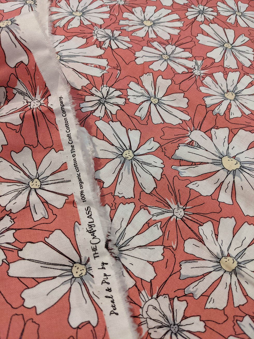 Fabric with large white daisy flowers, on pink background, lovely textile design.