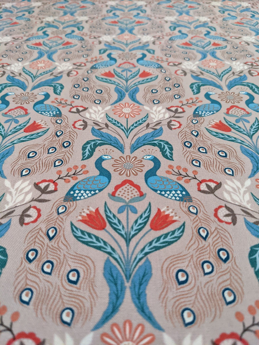 Thumbnail: Decorative fabric pattern with peacock design, floral elements, and detailed symmetrical layout.