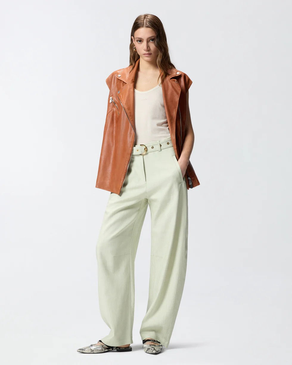 Miniatura: COLETE DE PELE