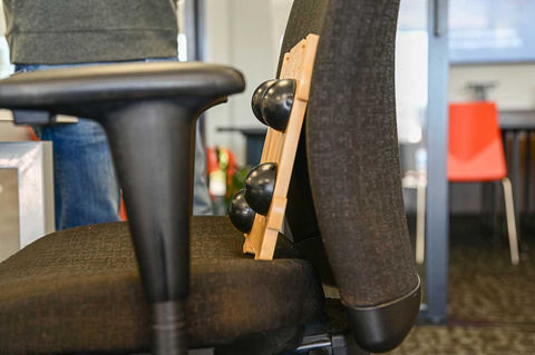 trigger point massage in officechair at work