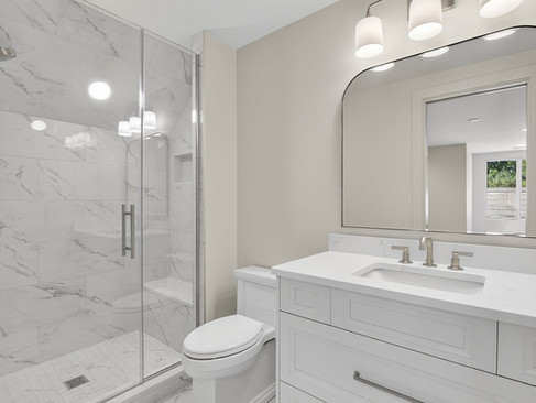 Gorgeous modern white marble updated bathroom