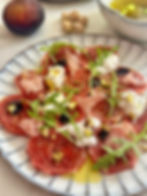 Vijgen met burrata mozzarella parmaham pistache dressing
