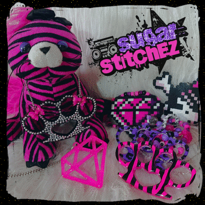 Sugarstitchez glitter gif with necklaces on display