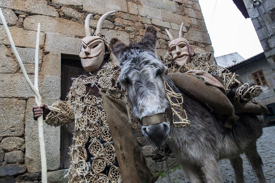 Locals playing in the Carnival, at Lazarim, Portugal