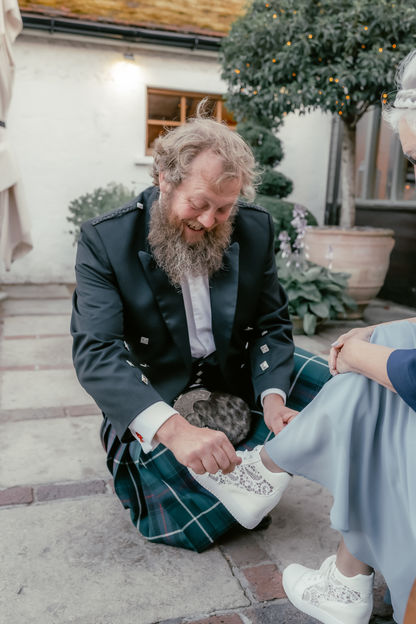 East Sussex wedding photographer capturing a relaxed ceremony at Pangdean Barn