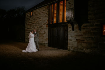Bride and groom outside night time shot