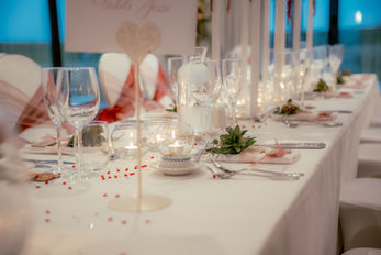 Elegant wedding reception inside The Relais Cooden Beach overlooking the sea.