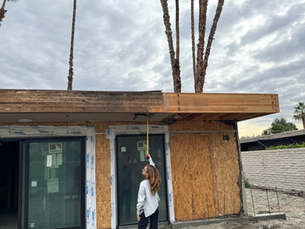 Chris at exterior homesite. Window covering specialist.