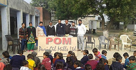 Puri Oil Mills distributes winter clothing and stationary to students at Government middle School in Khukhani & Mussapur