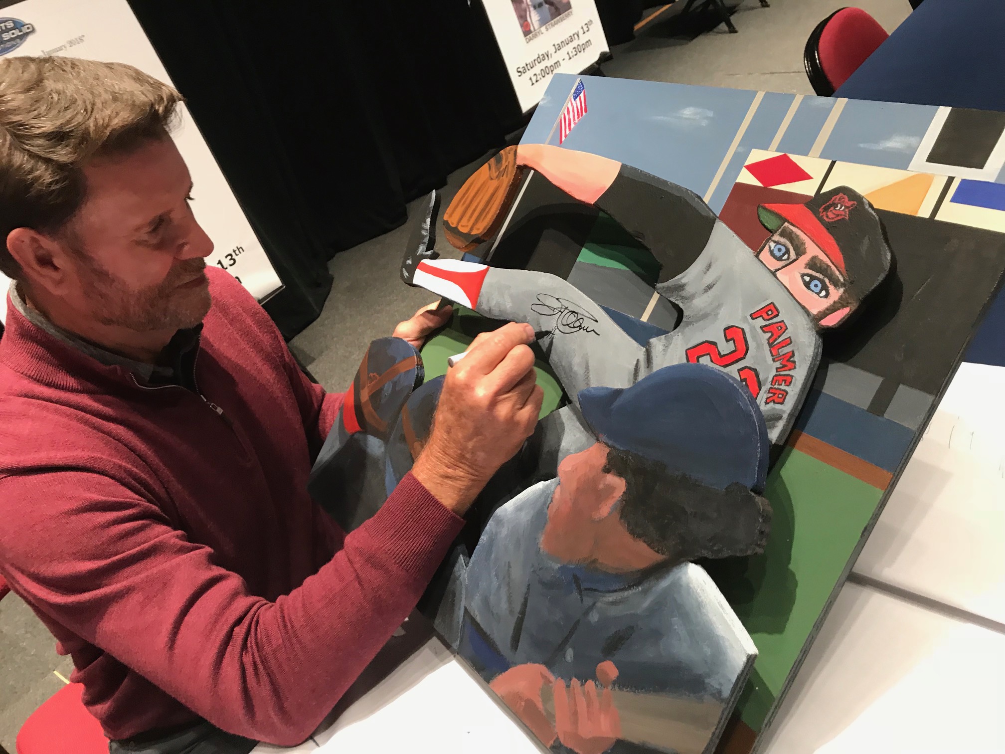 Jim Palmer signing painting