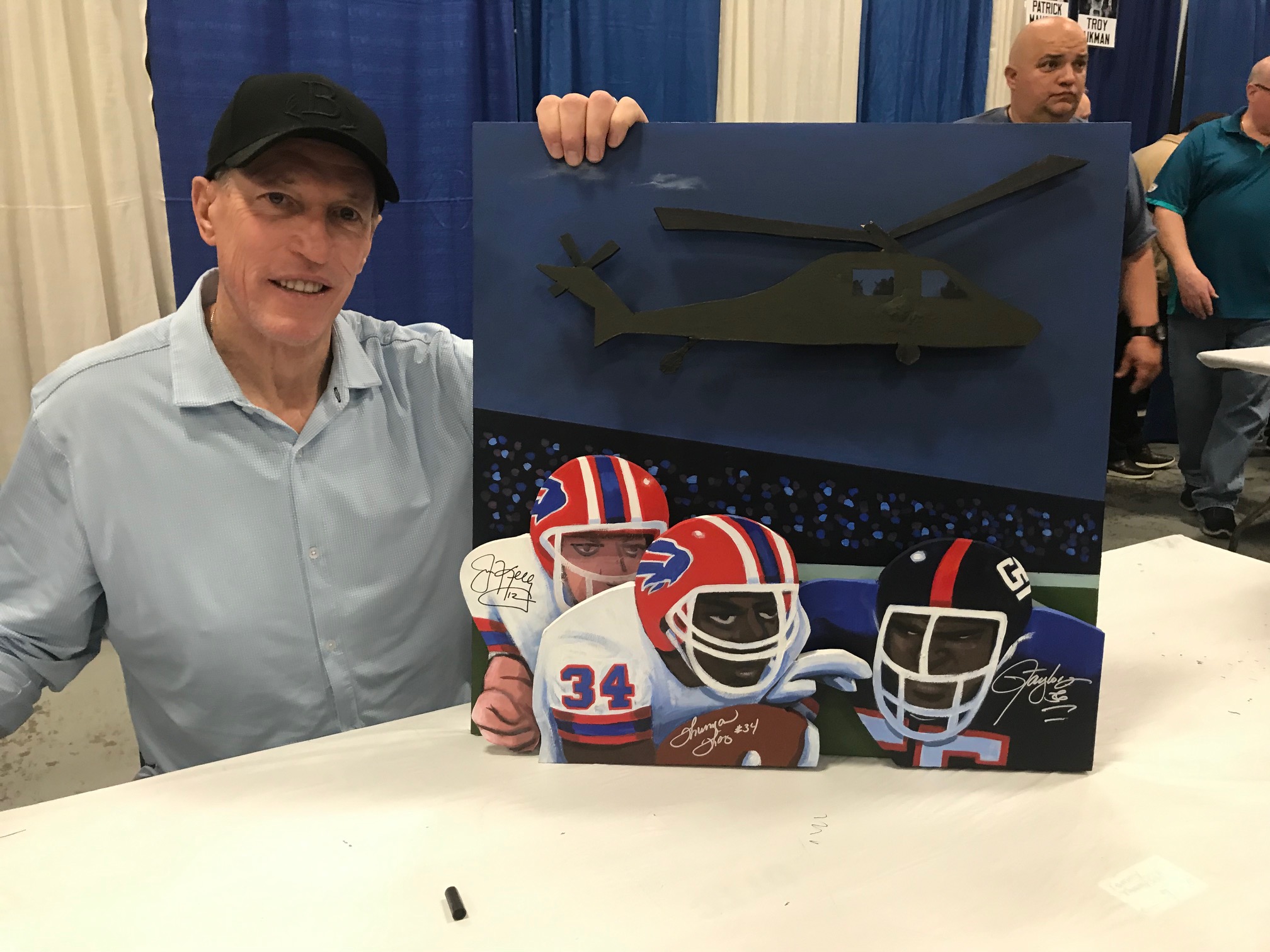 Sax Jim Kelly signing painting