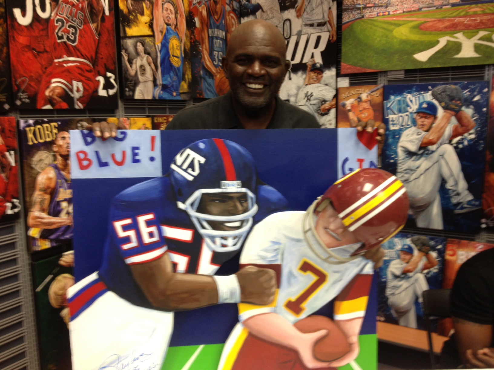 Lawrence Taylor with painting