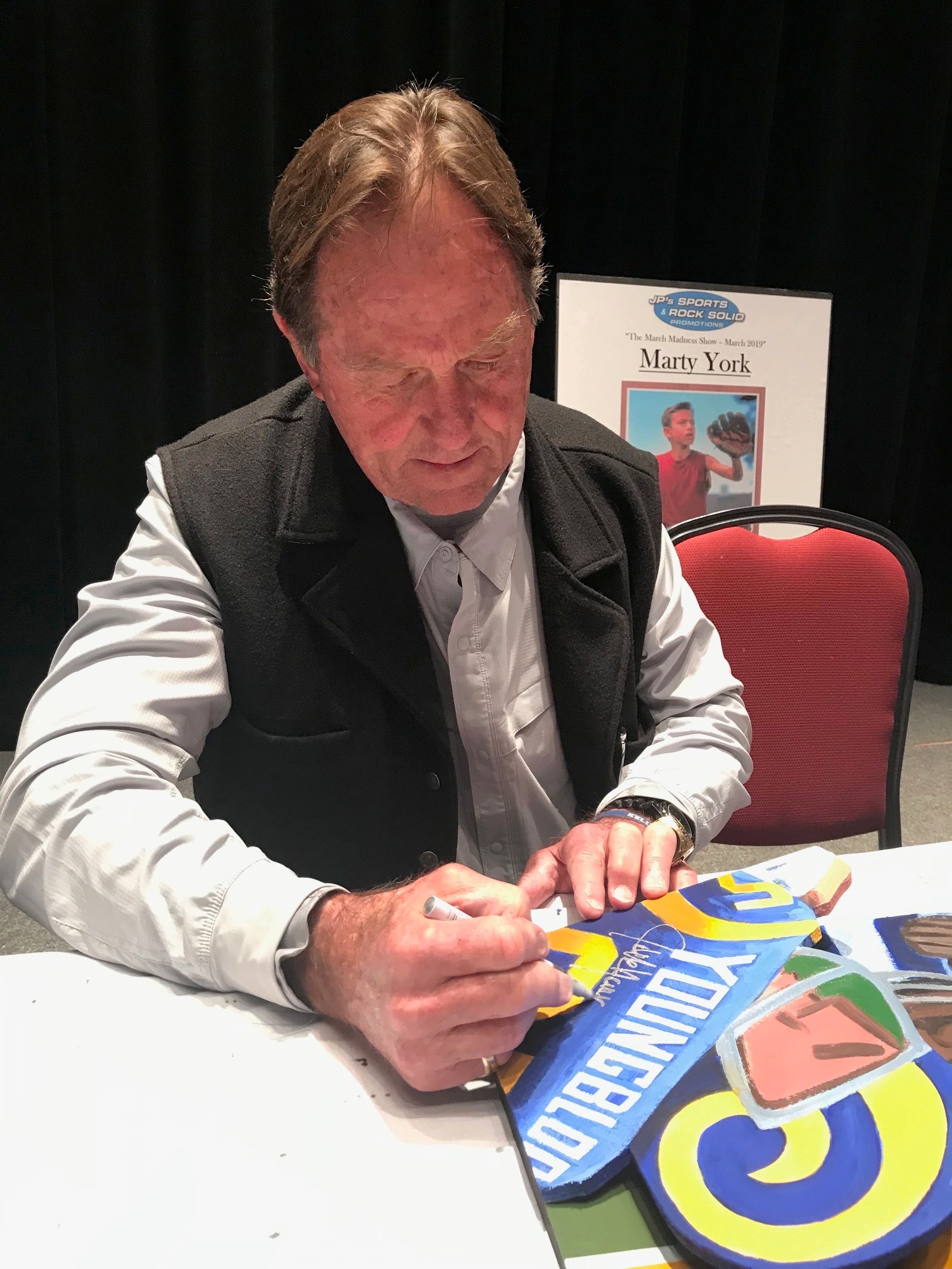 Jack Youngblood signing painting