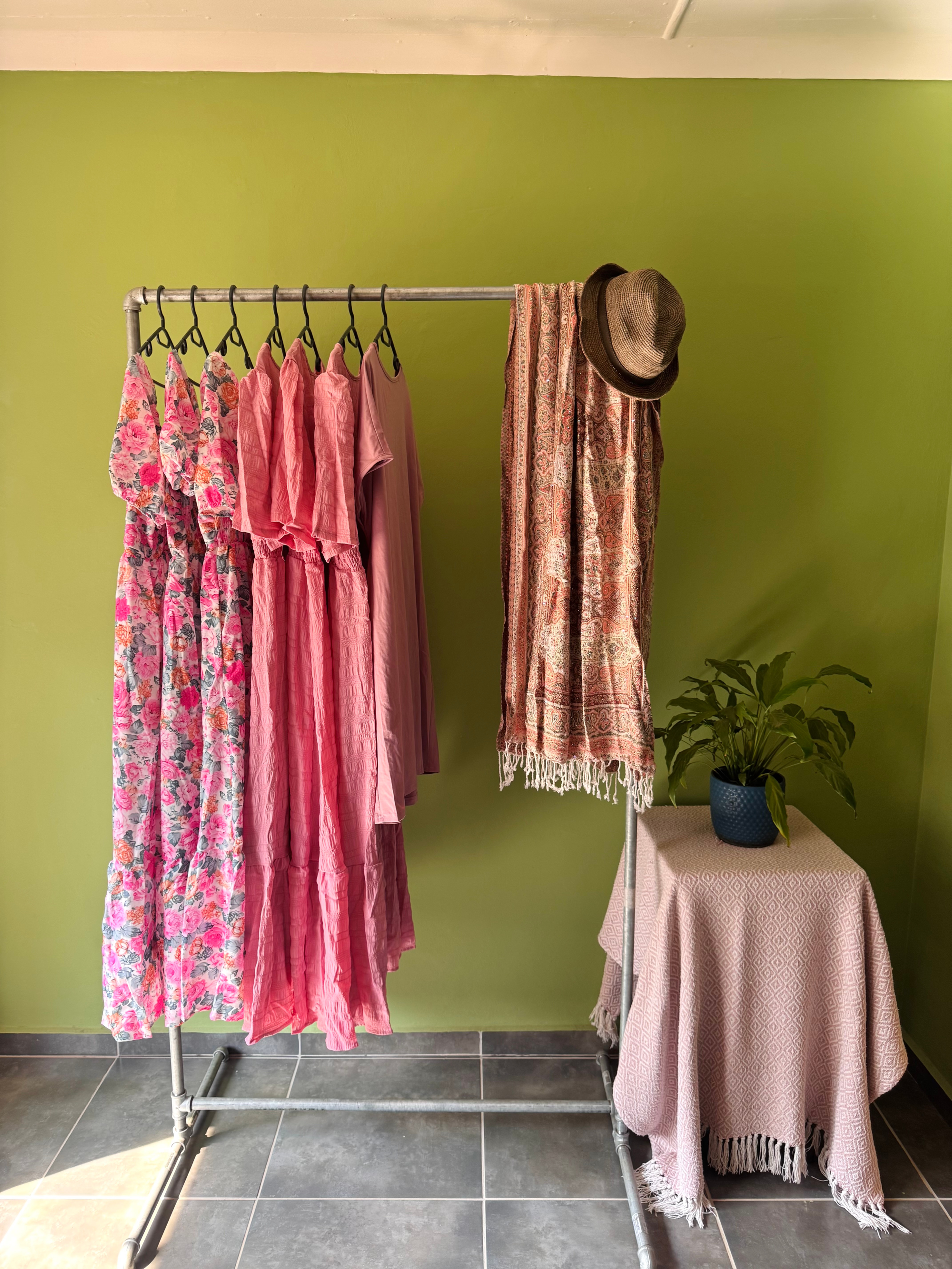 Maternity dresses in soft pink tones