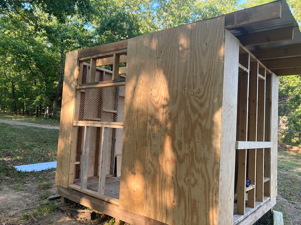 Shows the in process build of the coop.