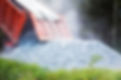 Dump truck dumping gravel.jpg