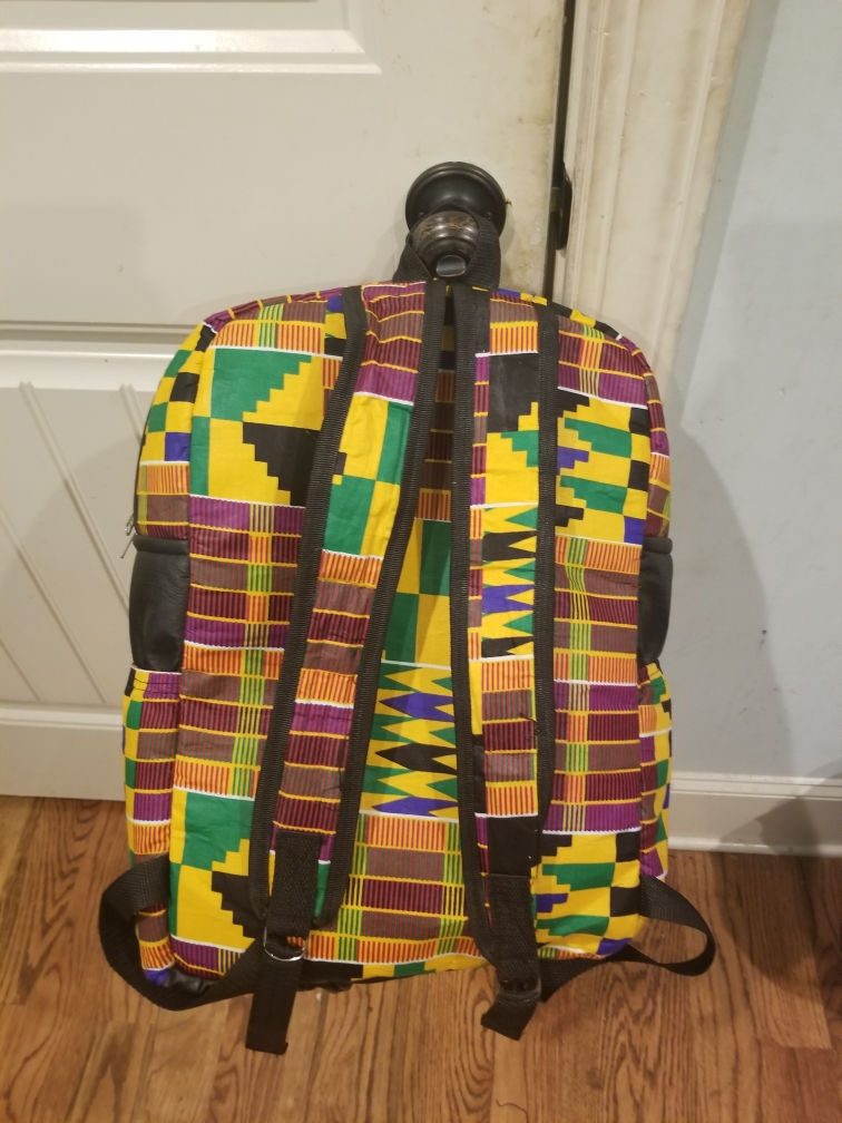 Thumbnail: Kente Fabric & Leather Backpacks With Symbols