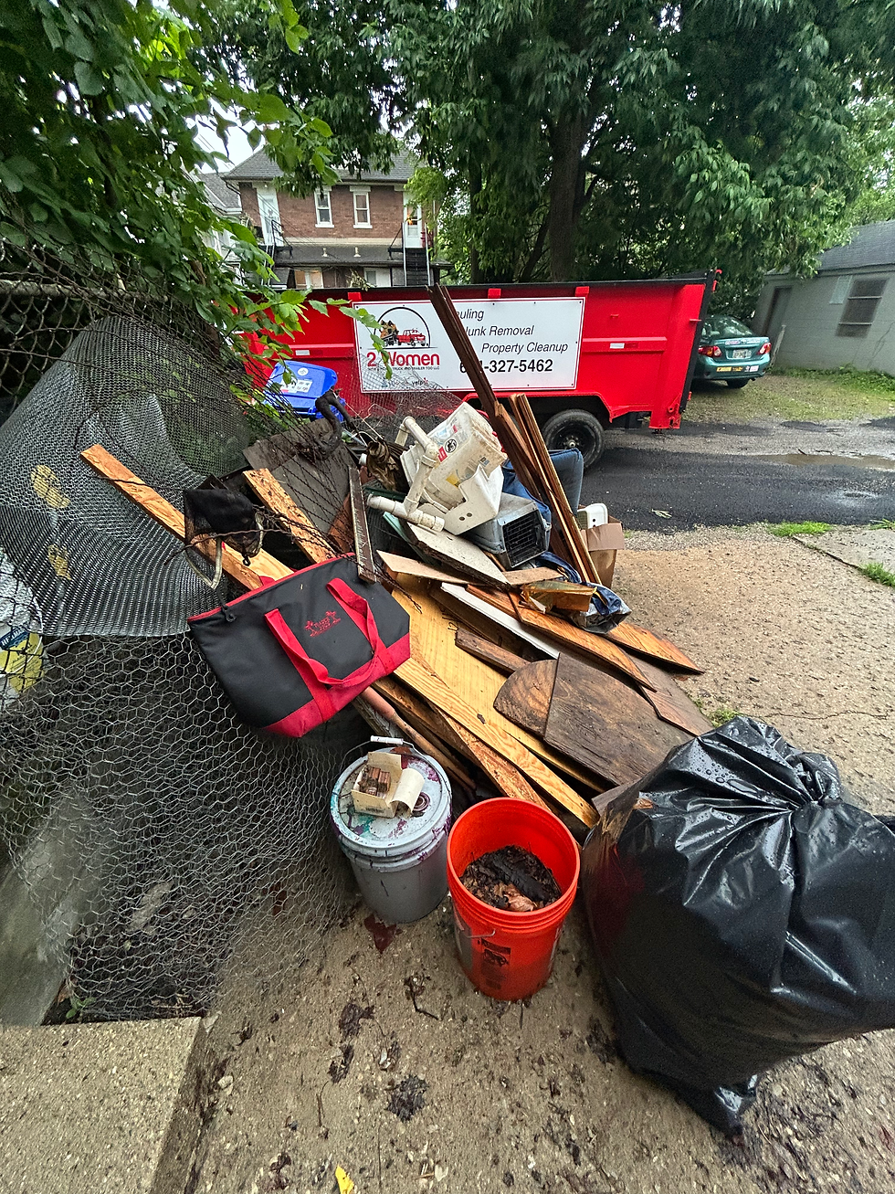 Trailer by trash pile.heic