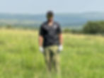 David standing in a field