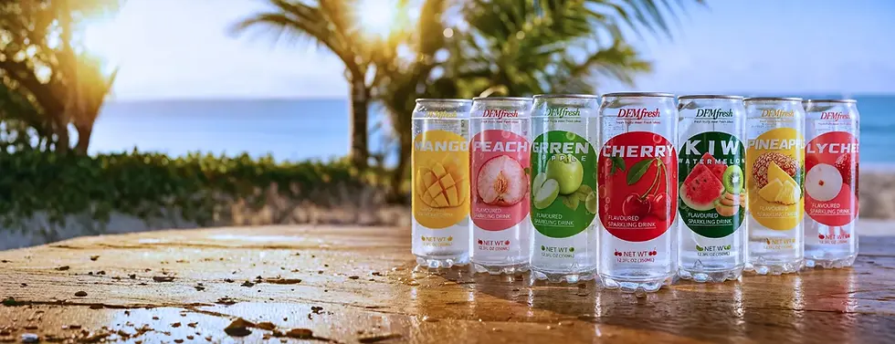 Eye-level view of a delivery box filled with sparkling drinks on a kitchen counter