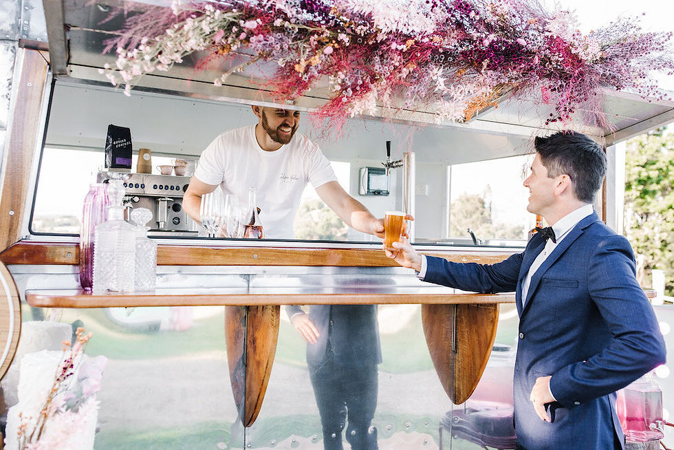 Service of a drink out of the Silver Belle Vintage Caravan