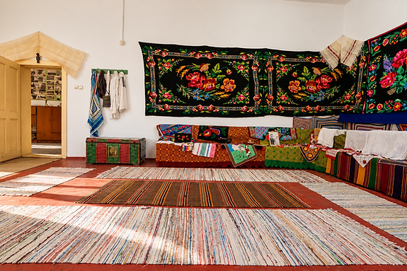 Folkloric Room with Embroidered Textiles.png